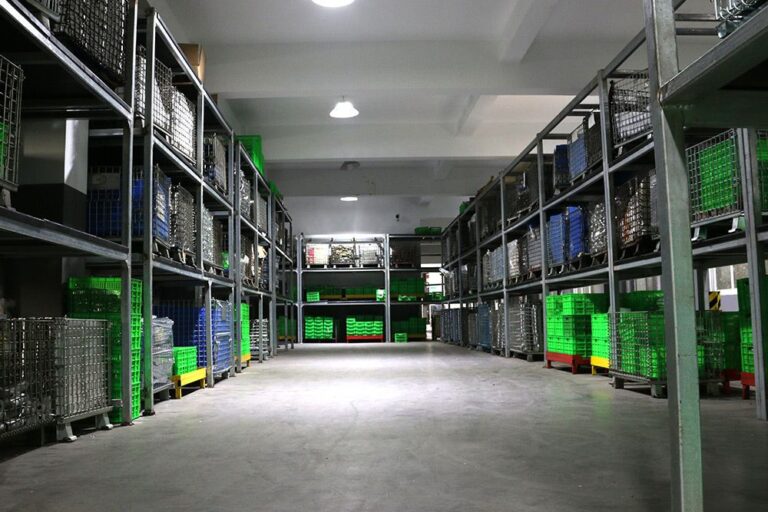 Racks of green component bins in the NBFEIYU semi-finished product storage area