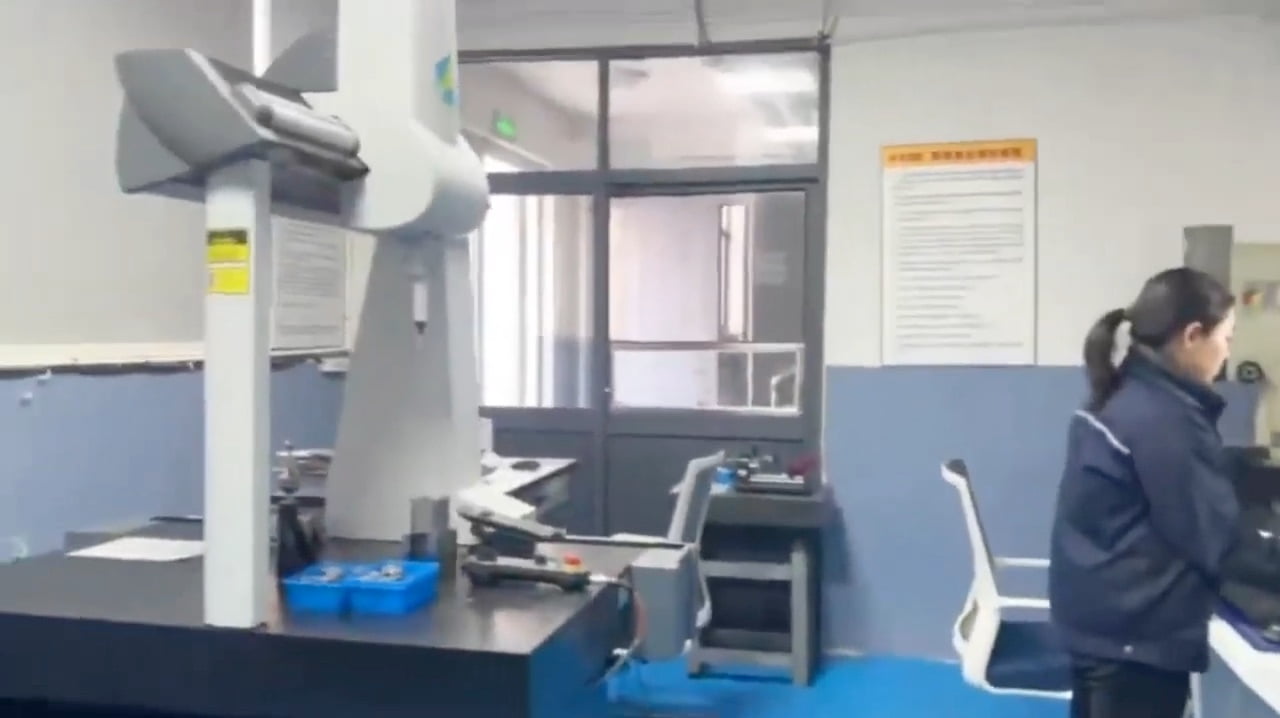 Precision machining area with batch production bins at Ningbo Feiyu