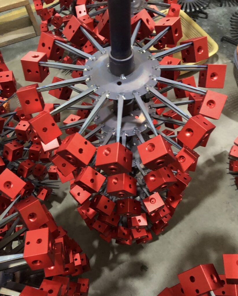 Red anodized aluminum OEM parts after surface treatment