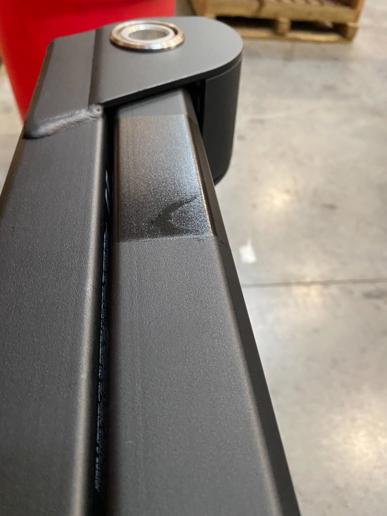 Stripe deformation defect on black coated metal product surface