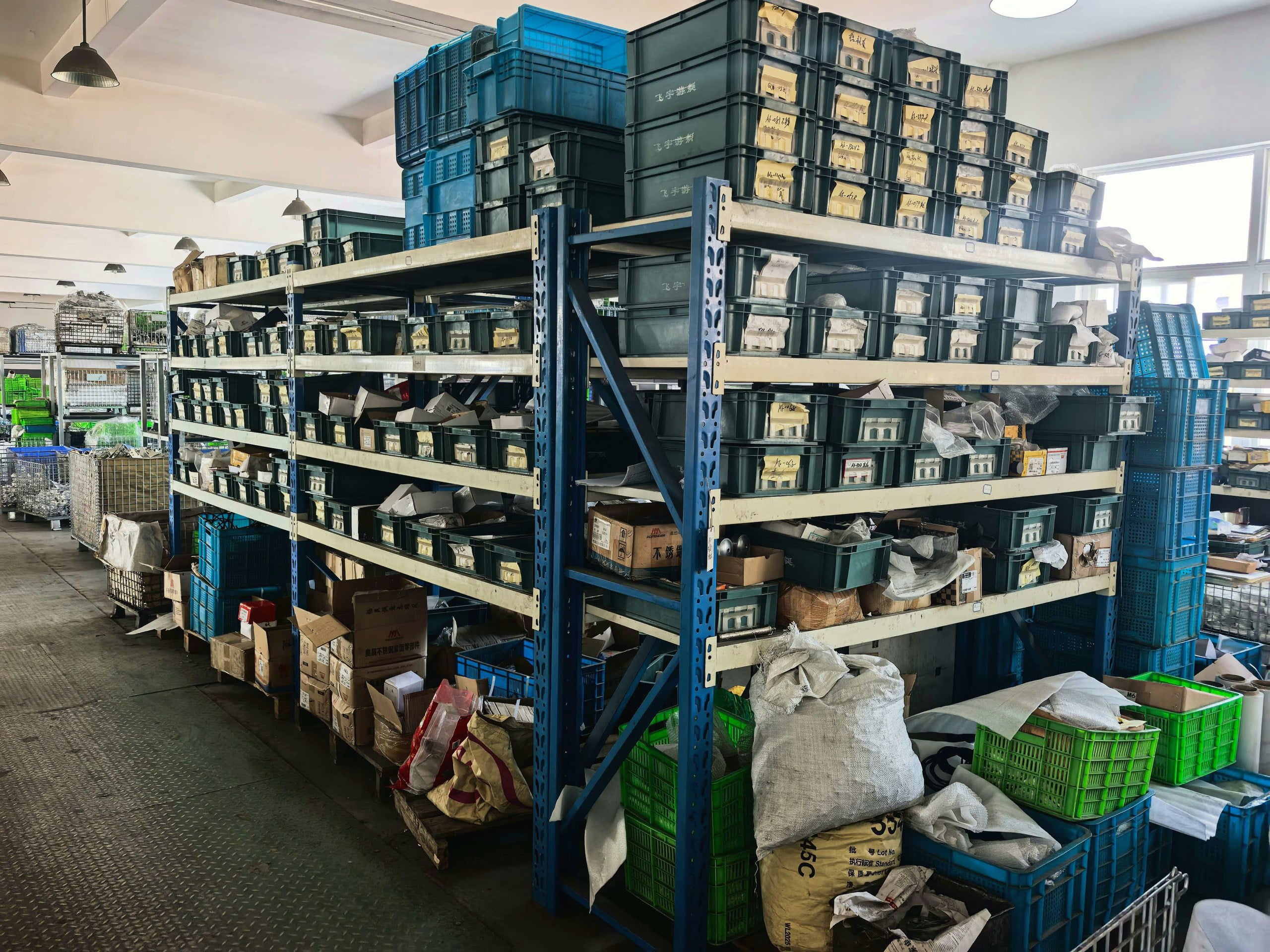 Labeled component boxes and storage bins arranged on NBFEIYU warehouse racks